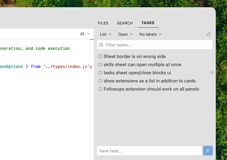 The Tasks panel beside an open editor: the workspace's list, filter dropdowns, and the quick-add box docked at the bottom