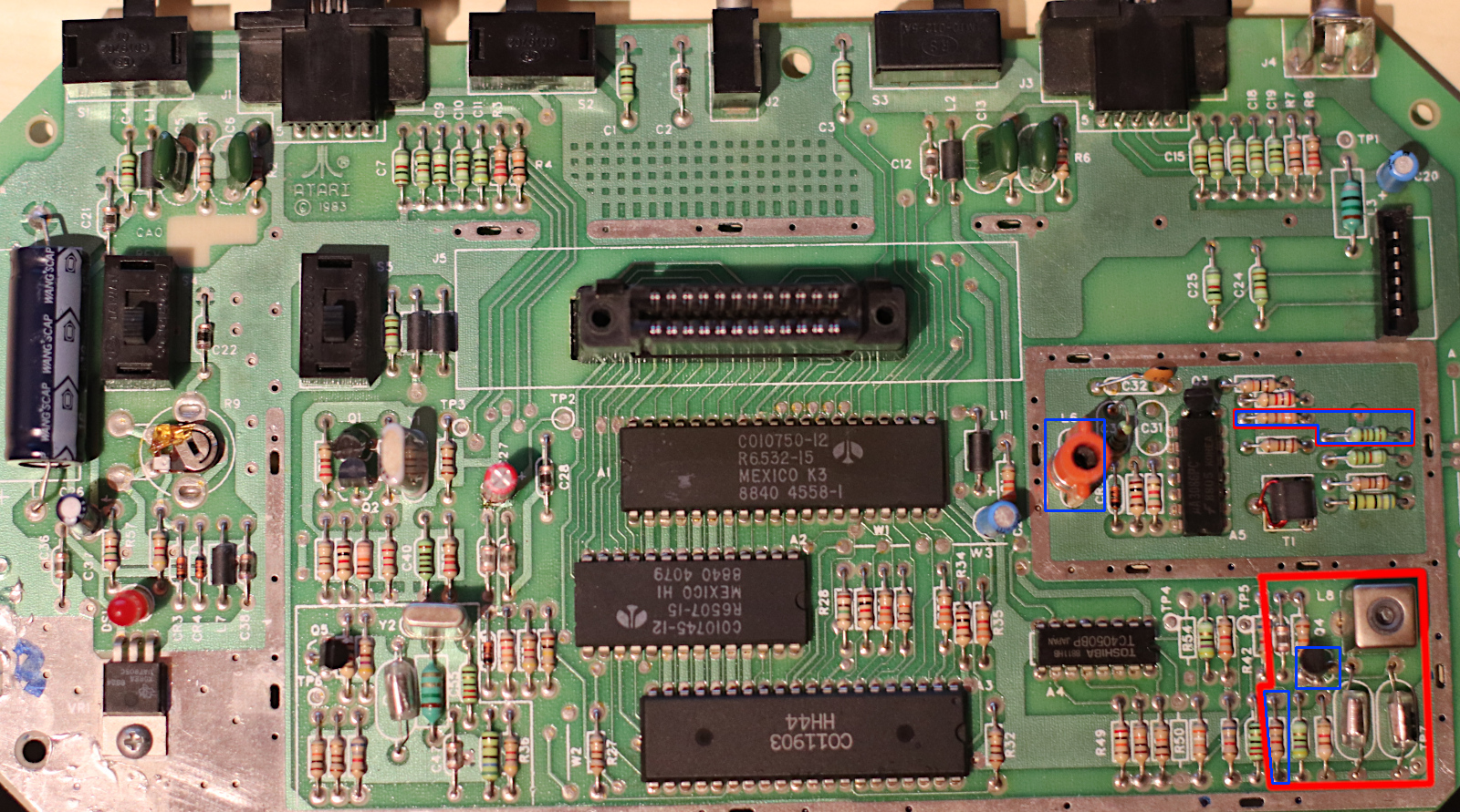 Image of CO21503 Rev F with components to remove. C54 is the most right bottom component of the complete board. Than to the left C53, R43, C52, R56. Above C54 is L8 than to the left R48, C49. Above L8 are three components not to remove followed by C33. And left of C33 is R17 also around half a centimeter above C33. L6 is further to the left, after a DIP16 chip and three axial or one radial mounted components.