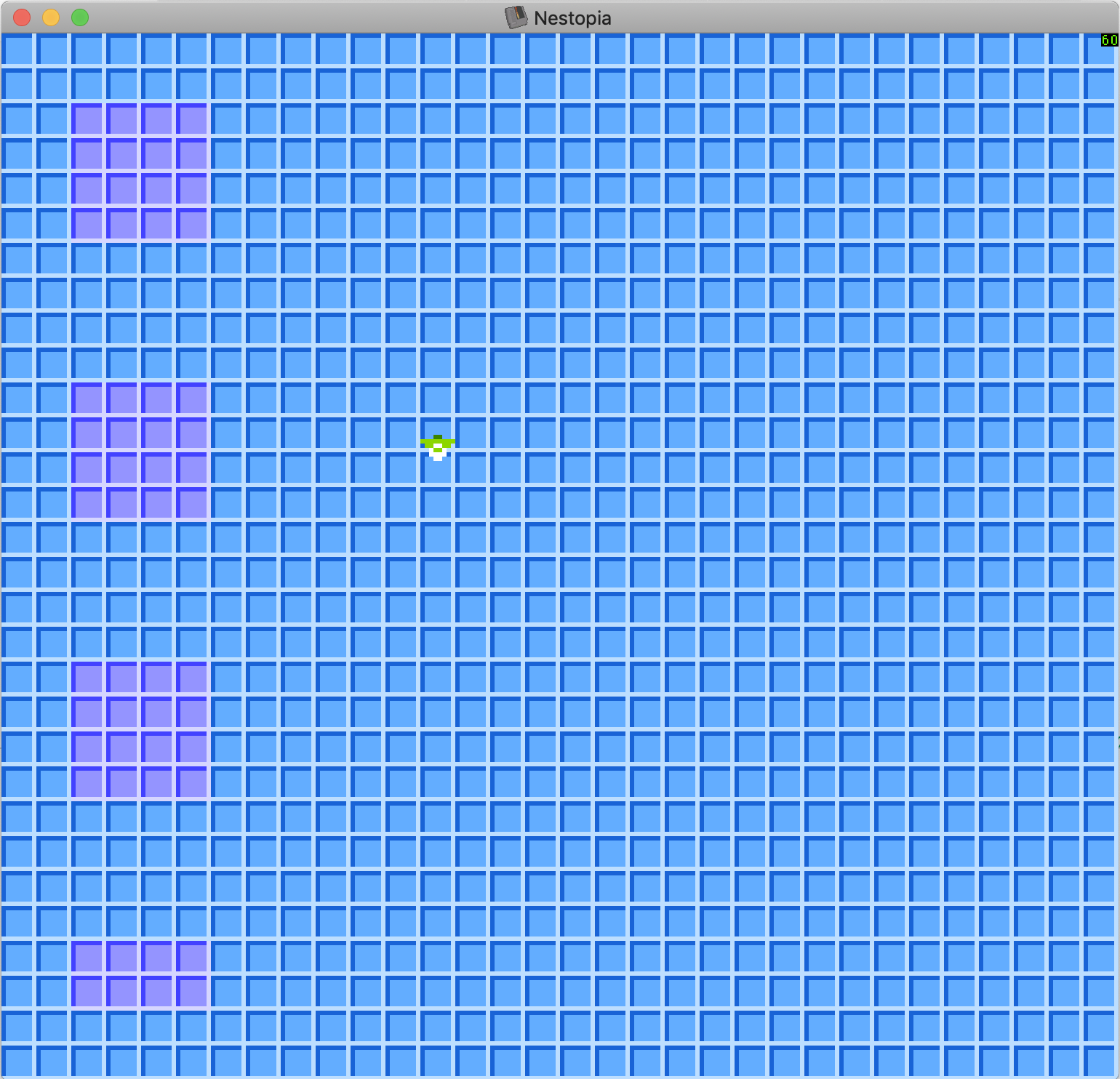 Screenshot of the game running, it shows a small green and white sprite against a three tone blue colored grid. Some sections of the grid use a three tone purple grid.