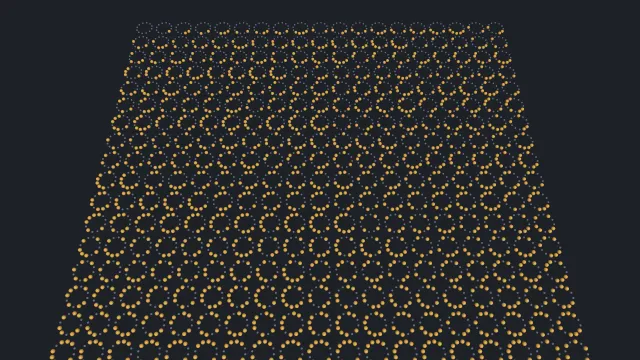 Rows of rings of twelve small beads on a dark background, receding into the distance, each ring with some beads lit in yellow.