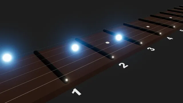 The fretboard at an angle, with the three blue chord markers glowing with a wide halo of light.