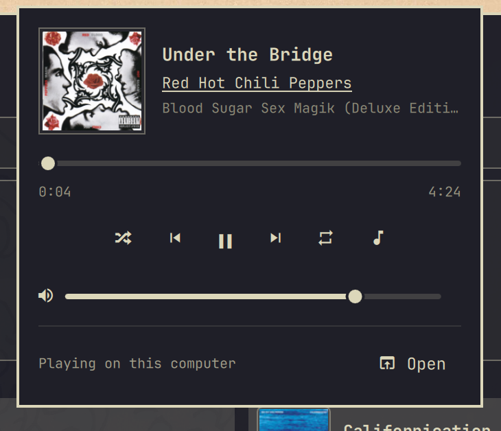 Omarchy Spotify mini player playing Under the Bridge