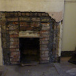 Breakout and expose original fireplace fit lintel