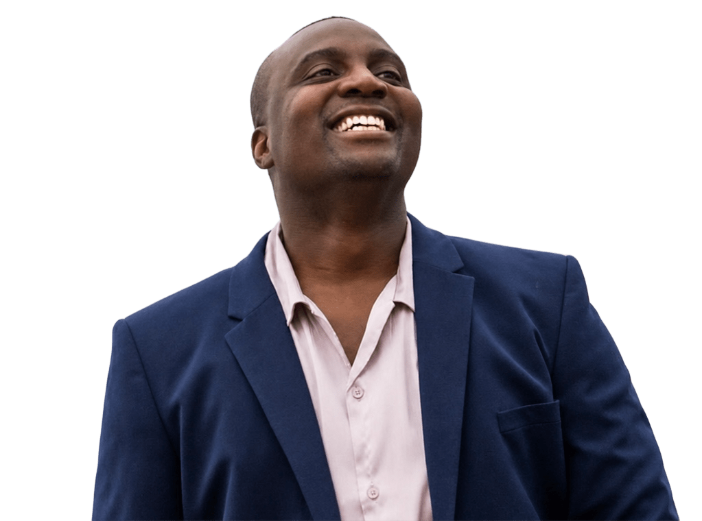 Steve Ryan smiling in a navy suit