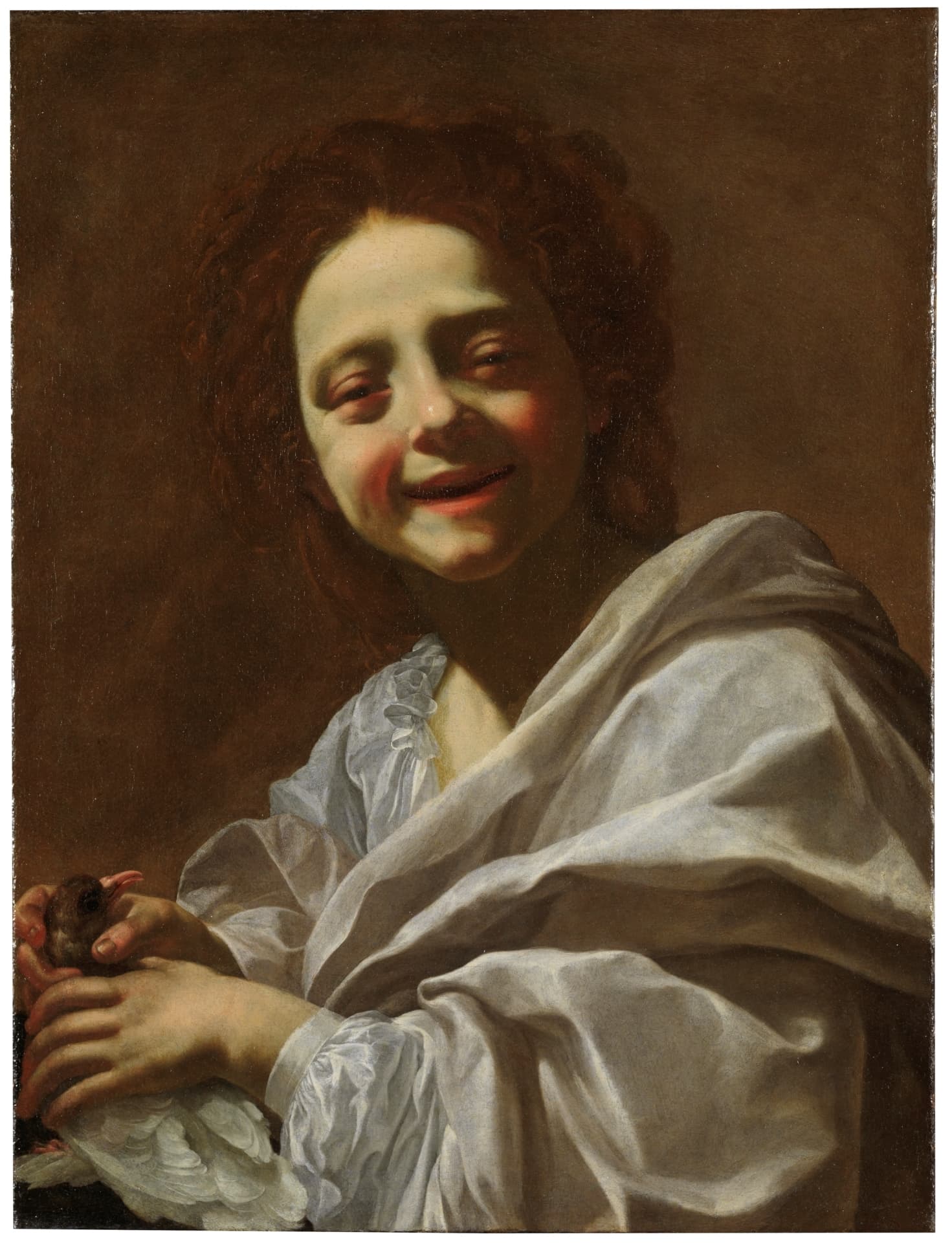 The Laughing Boy with a Bird by Bernardo Strozzi (c. 1620-1625)
