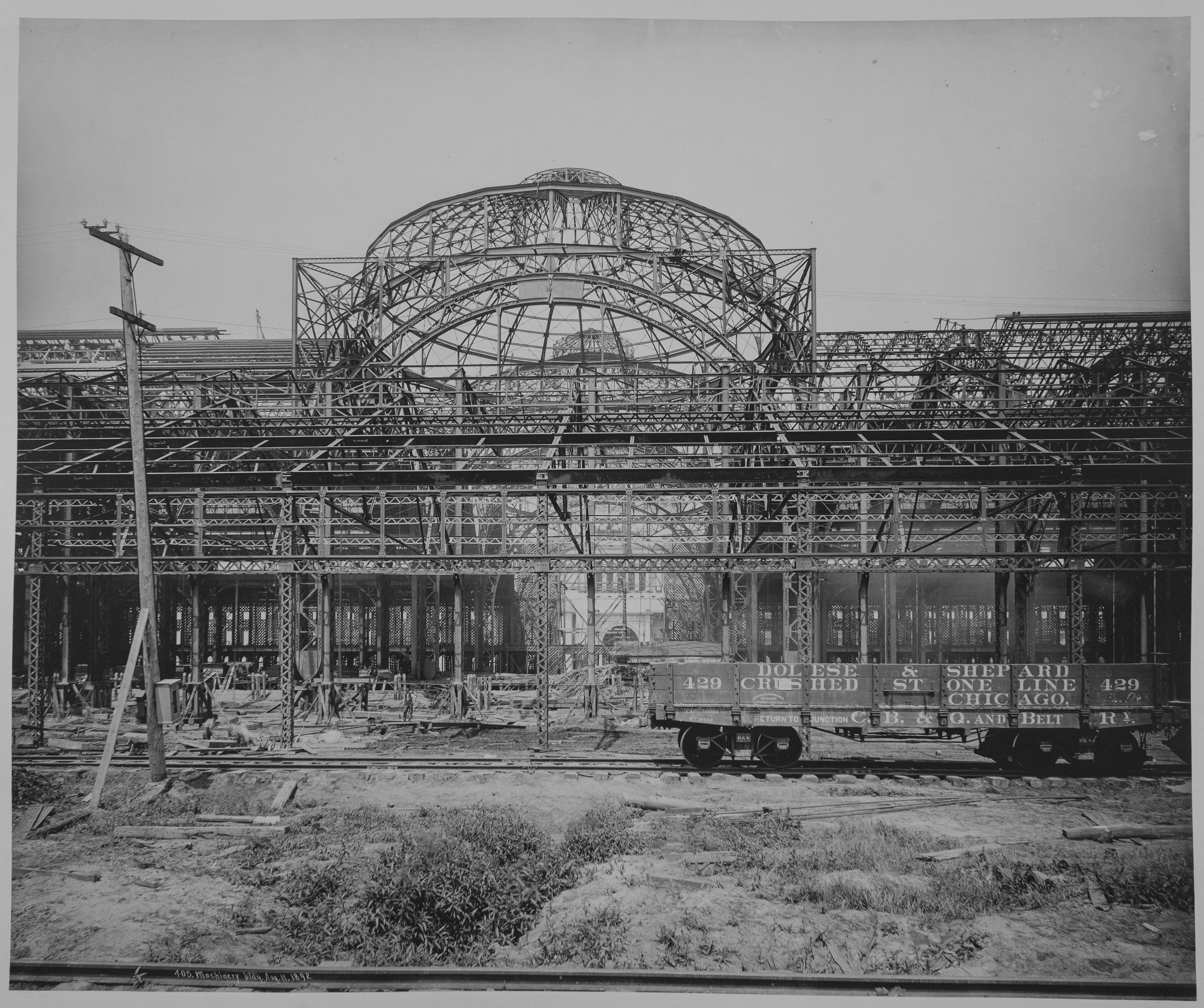 Black and White Photograph of the Steel Framework of a Large Domed Building Under Construction (1892)