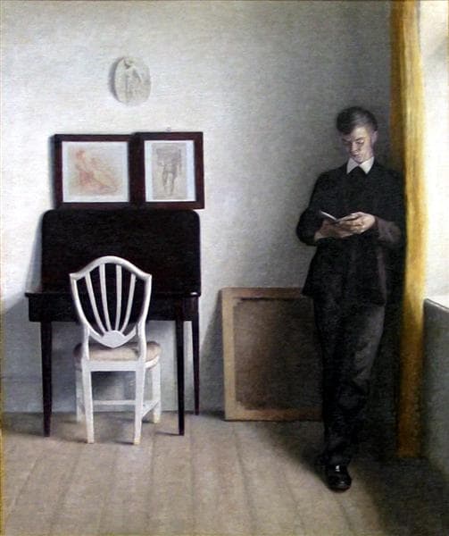 Interior with a Young Man Reading by Vilhelm Hammershøi (1898)