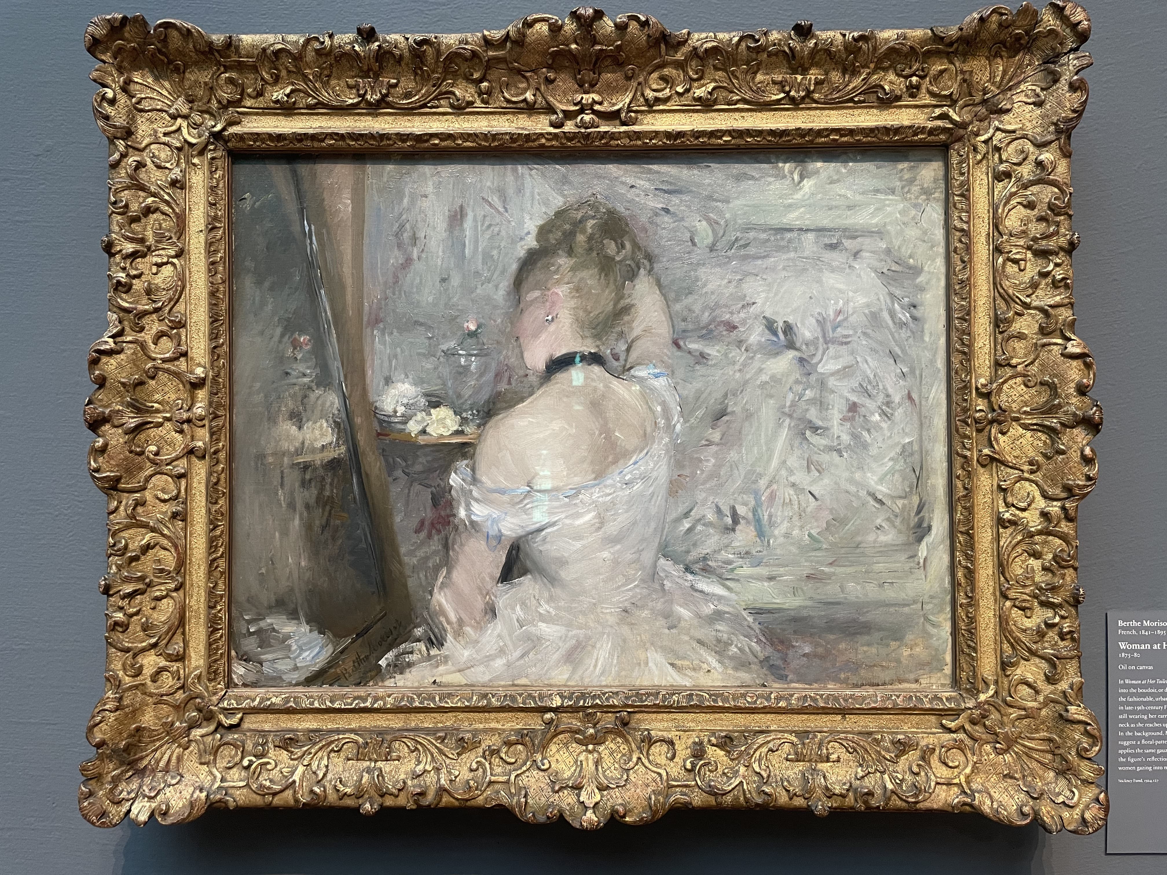 Woman at Her Toilette by Berthe Morisot (1875–80)