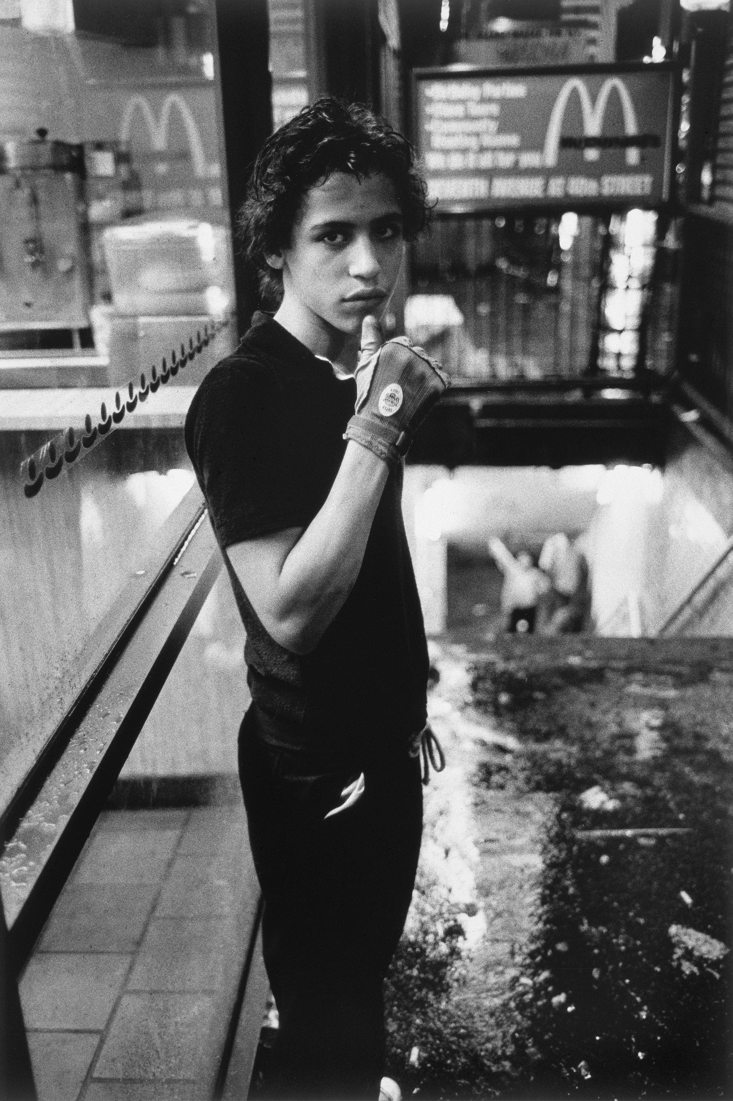 Boy with Glove, Times Square, New York by Bruce Davidson (1980)