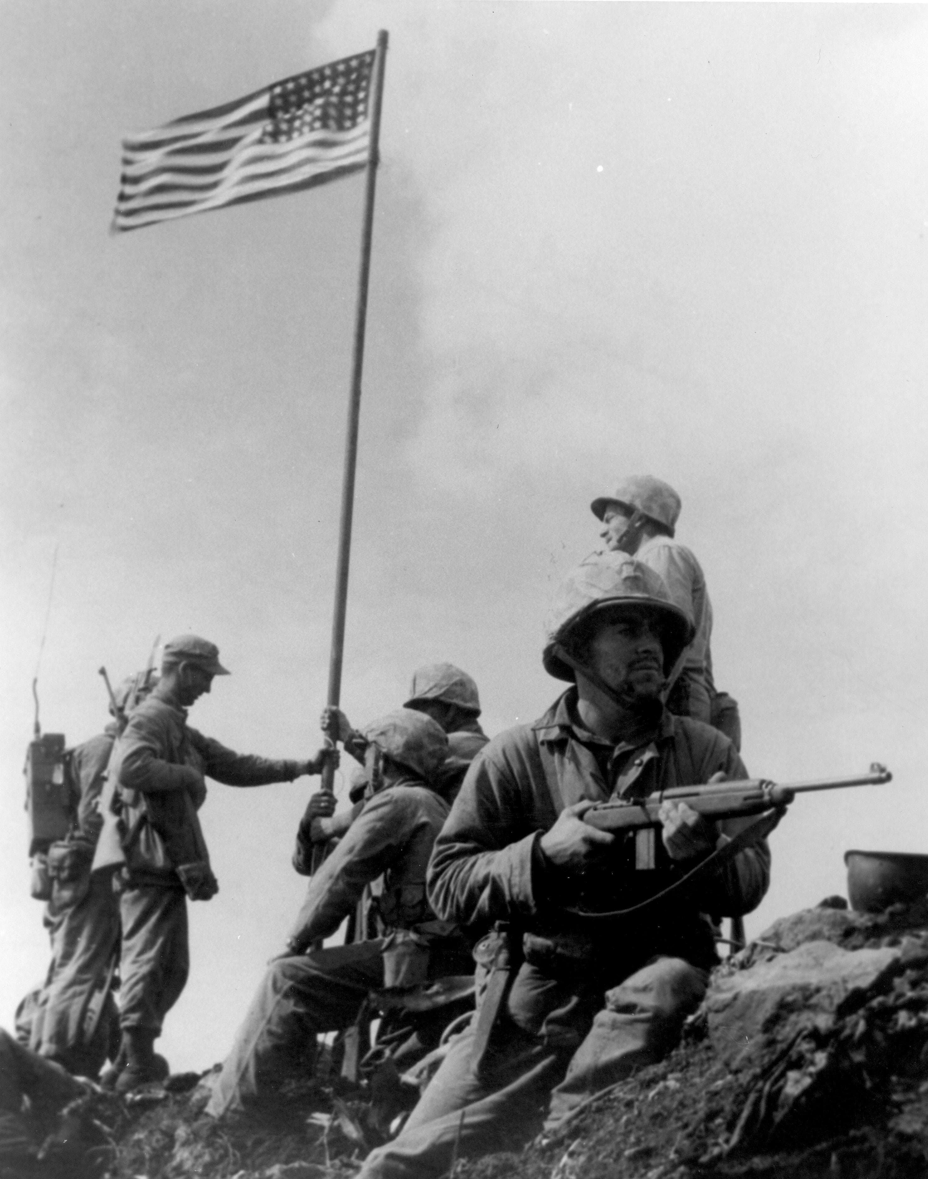 First Flag Raising on Iwo Jima by Louis R. Lowery (1945)