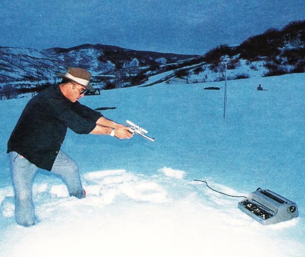 Hunter S. Thompson Shooting His Typewriter by Al Satterwhite (1977)