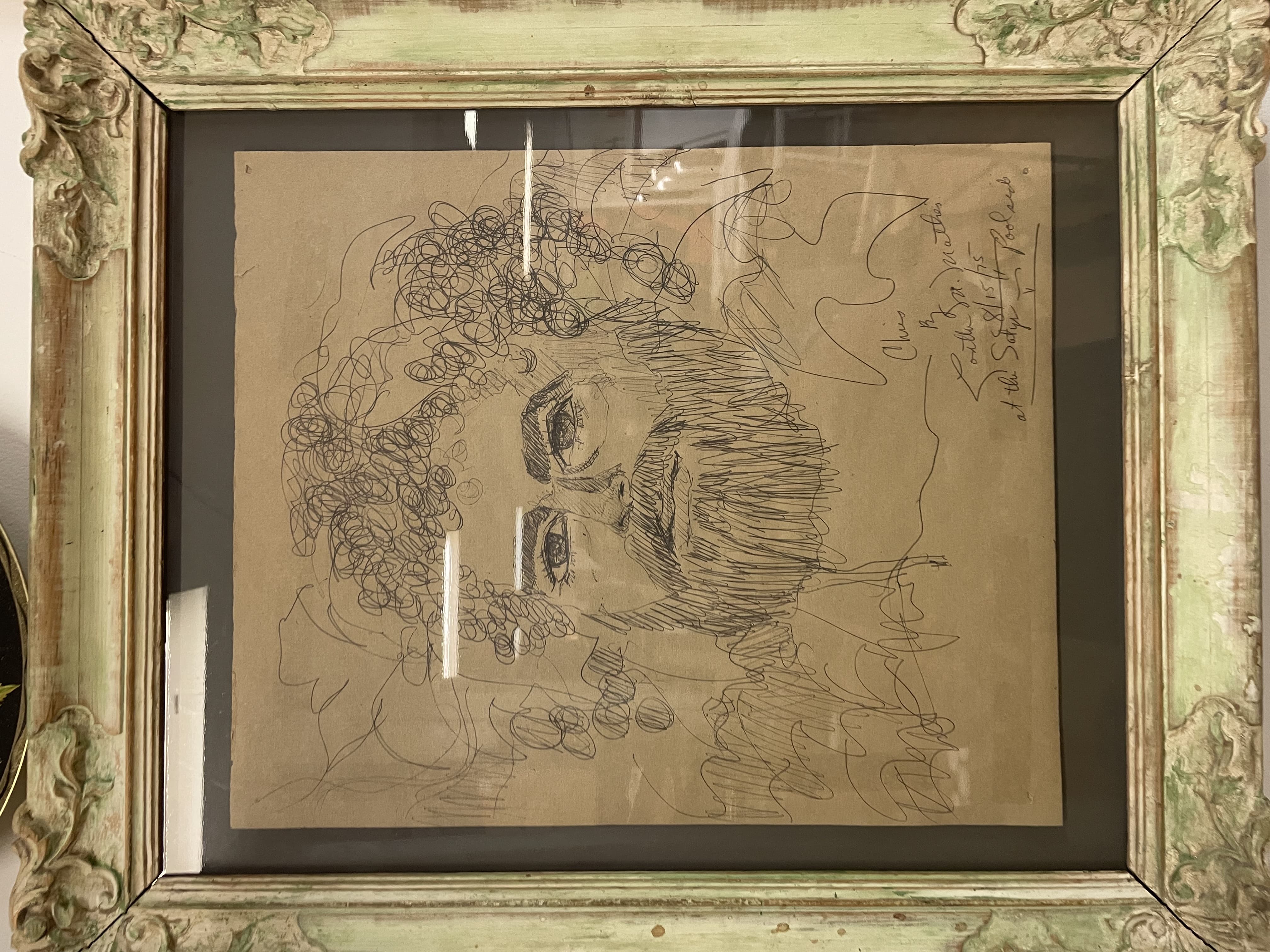 Pen and Ink Drawing of a Bearded Man with Curly Hair on Brown Paper (1975)