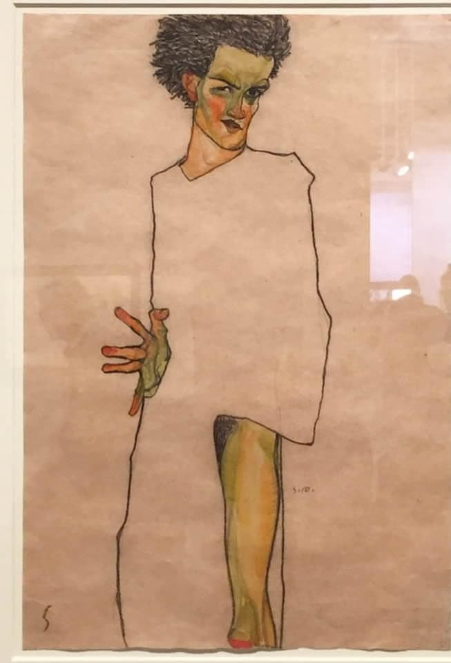 Self-Portrait with Green Face and Exposed Leg by Egon Schiele (1910)