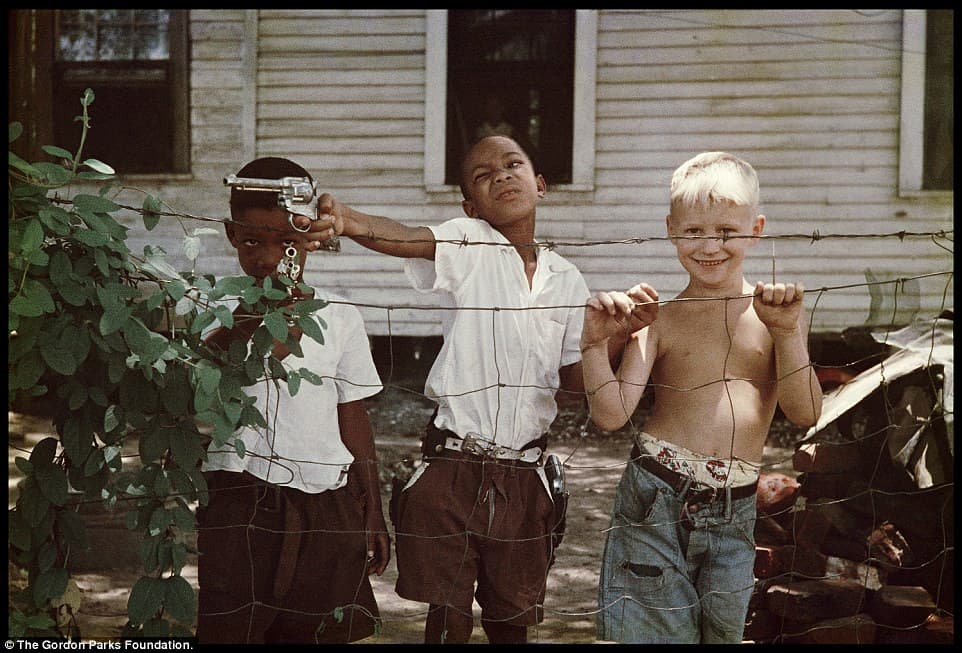 Three Boys with a Toy Gun, Fort Scott, Kansas by Gordon Parks (1949)