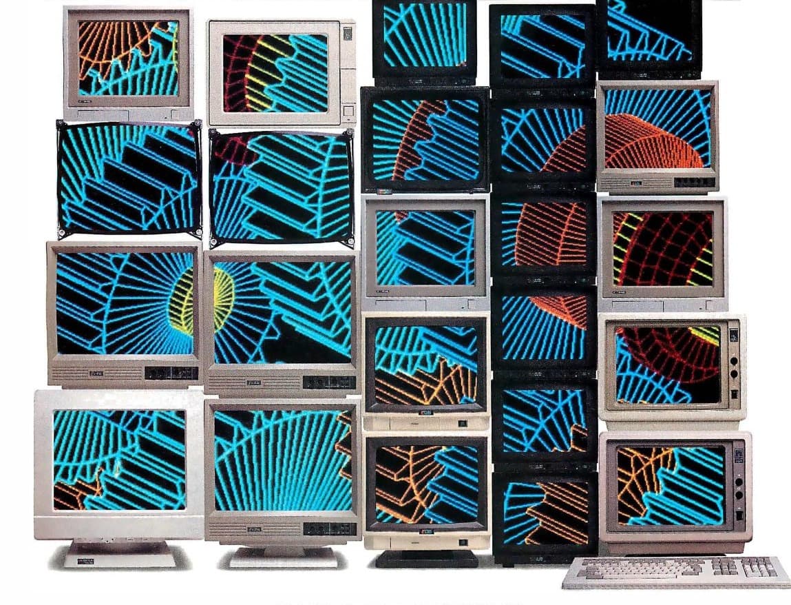 Photograph Multiple Vintage Computer Monitors Displaying Abstract Geometric Wireframe Graphics