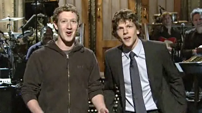Screenshot Mark Zuckerberg and Jesse Eisenberg on Saturday Night Live stage