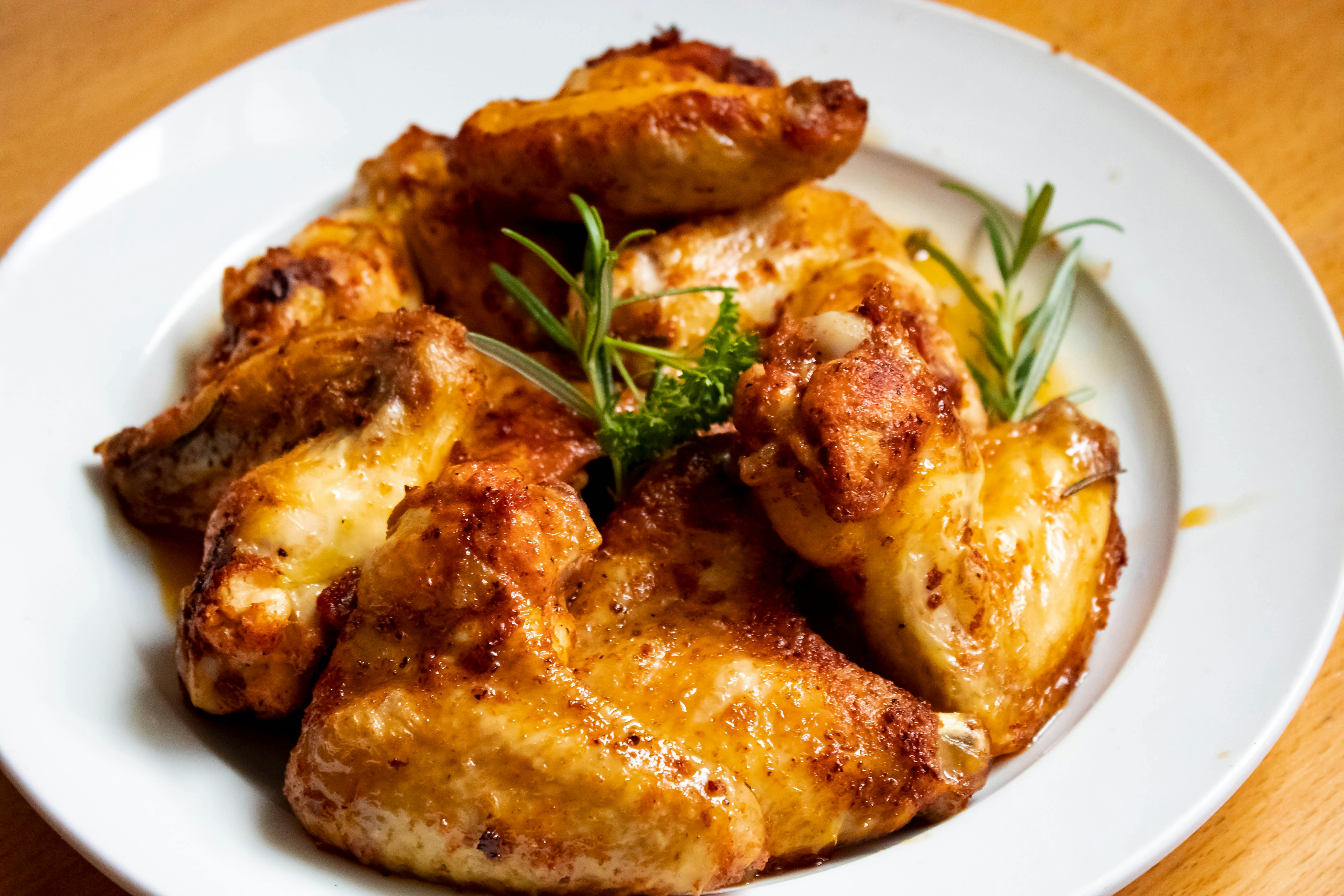 a plate of chicken wings