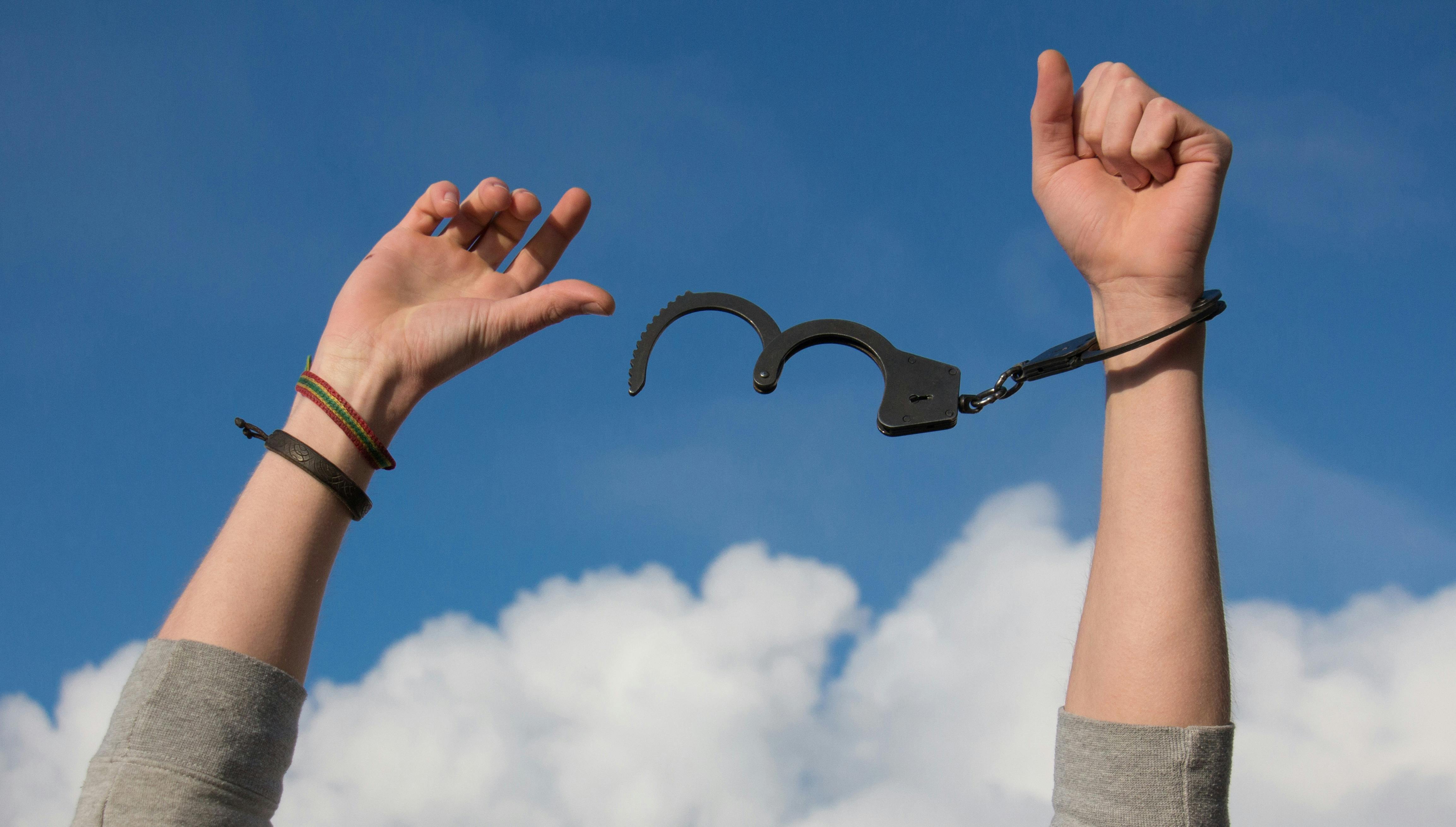 hands uncuffed from handcuffs