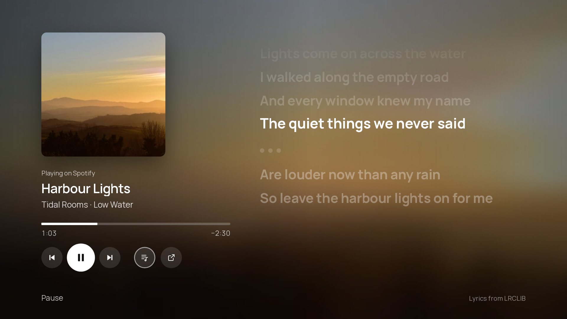 The music view: cover, progress bar, controls and synced lyrics