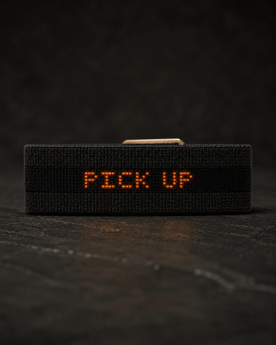 Black-on-black PHLOband — PICK UP glowing in the weave