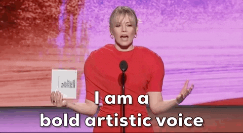 Comedian, Chelsea Lately, faces the camera and says, "I am a bold artistic voice", with a brief pause before saying, "with a lot of credit card debt"