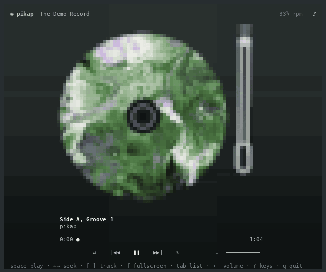 pikap playing its demo record: the needle is put down half-way in, the record is dragged back and forth to scratch, then it is drawn in ASCII