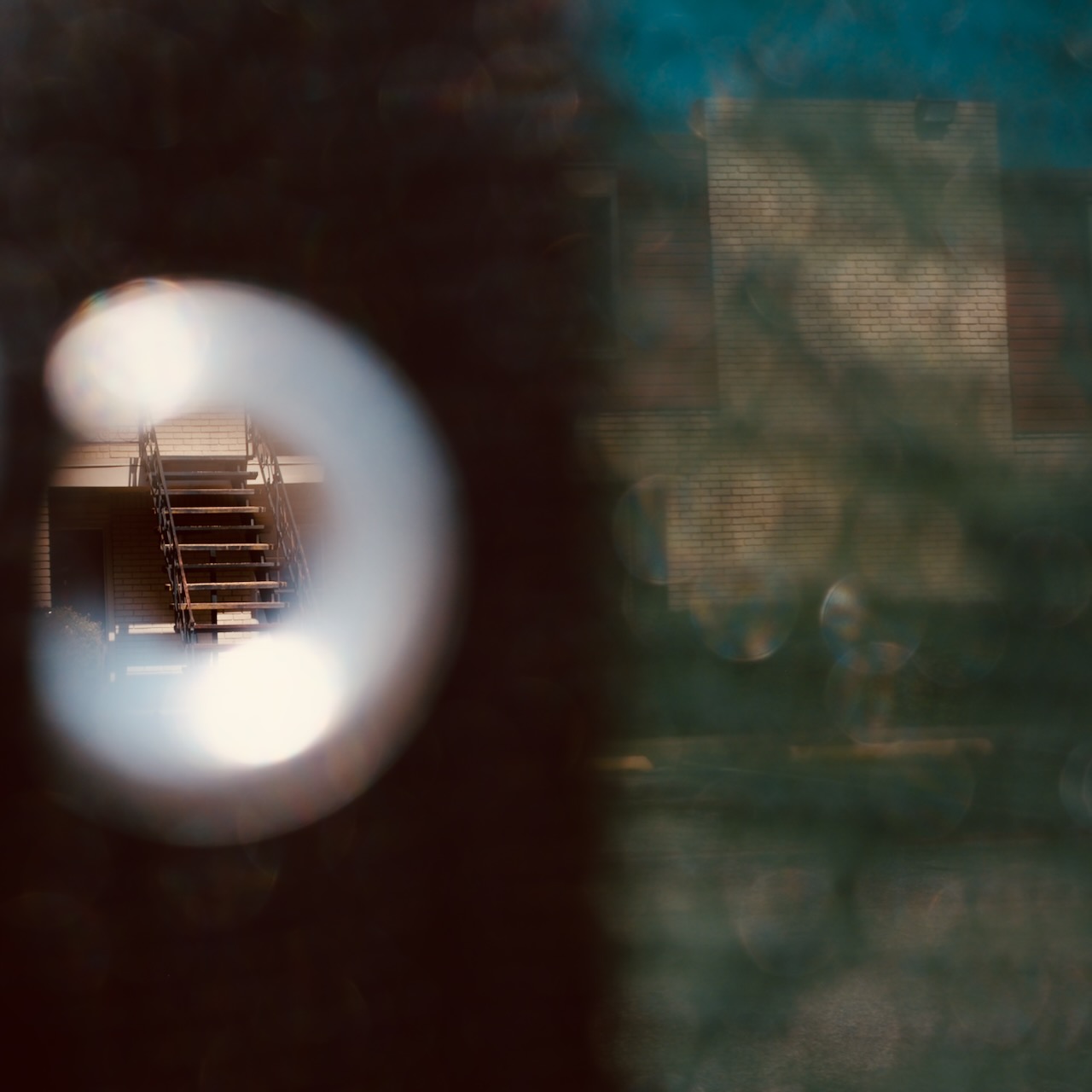 Option A - peering between the curtains at a dying complex