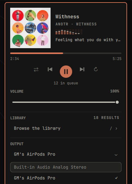 The output list open on the two devices, with the one in use ticked