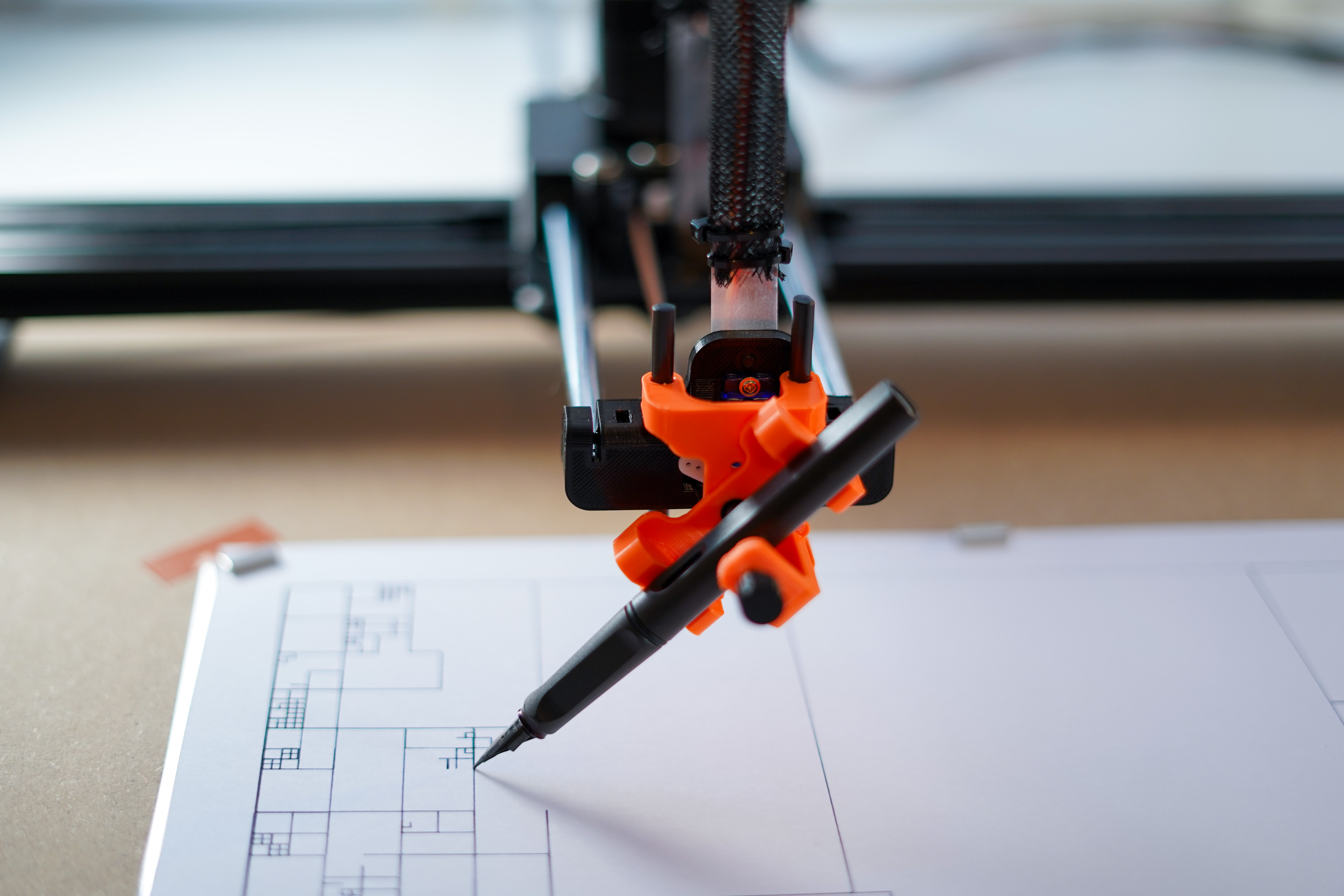 pen plotter attachment holding a fountain pen at 45 degrees