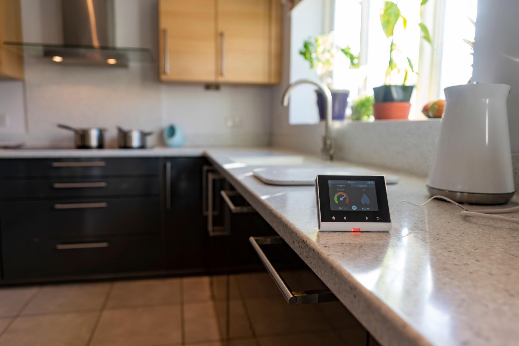 Smart meter on counter — the DCC connection that generates UKIB impact metrics automatically