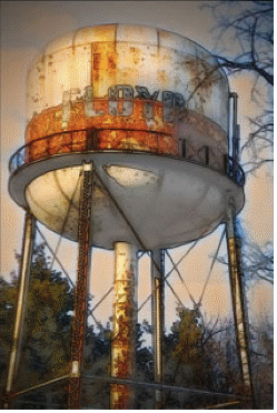 Photo of rusty water tower with the word Floyd the side