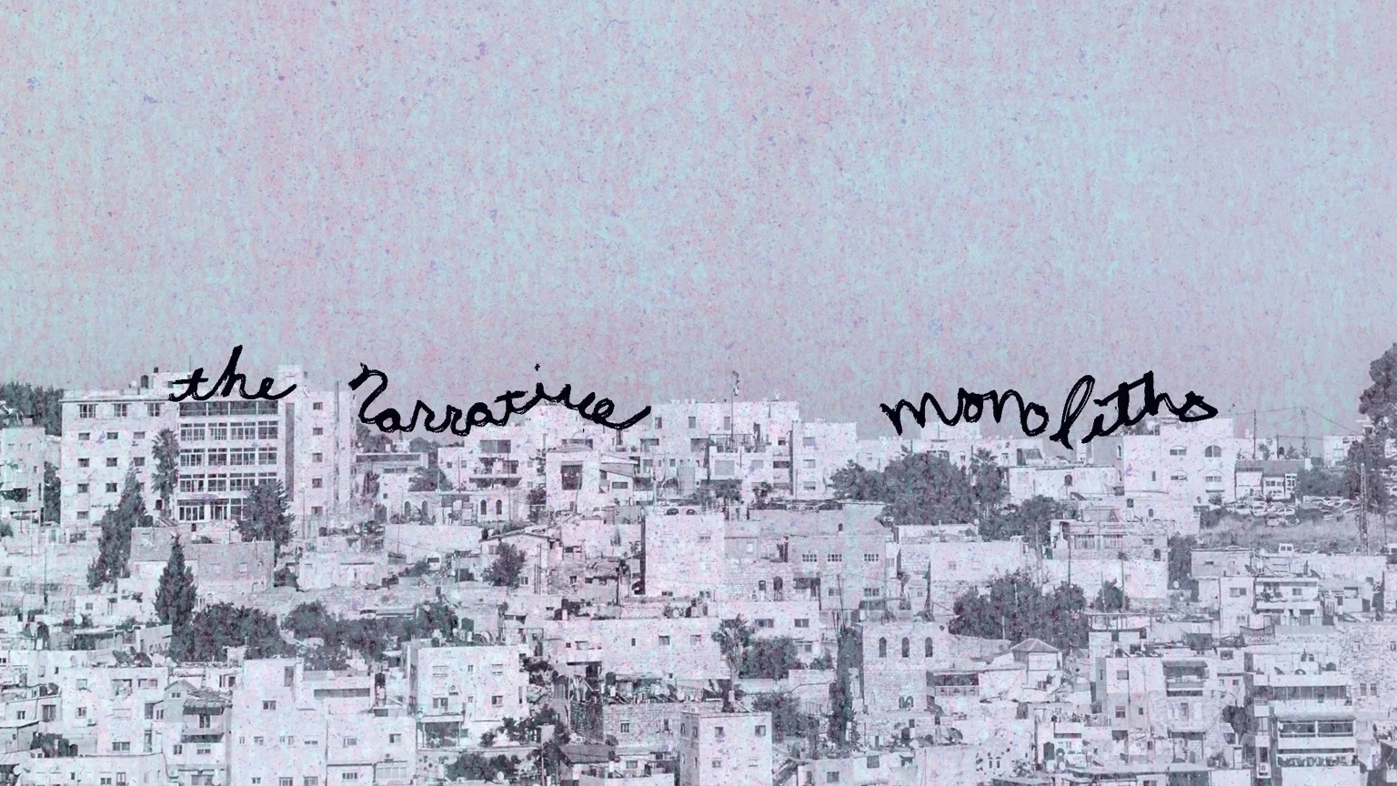 Contains black and white panorama of city with buildings on a hill with the narrative monoliths written on top of the first row of buildings