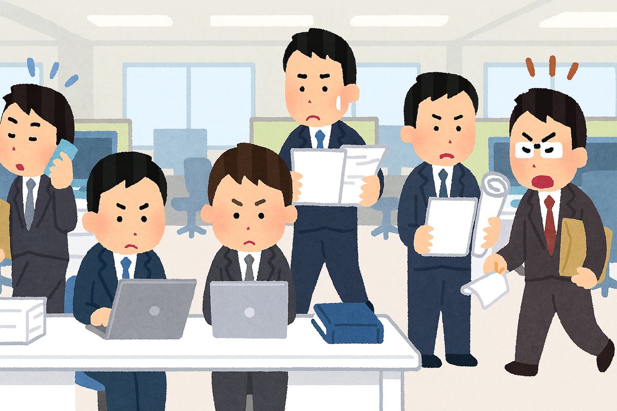 オフィスで忙しそうに働く、複数のビジネスマン