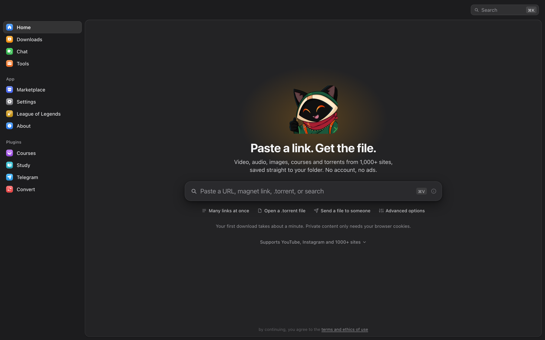 OmniGet home screen: paste a URL, magnet link or .torrent and the file lands in your folder