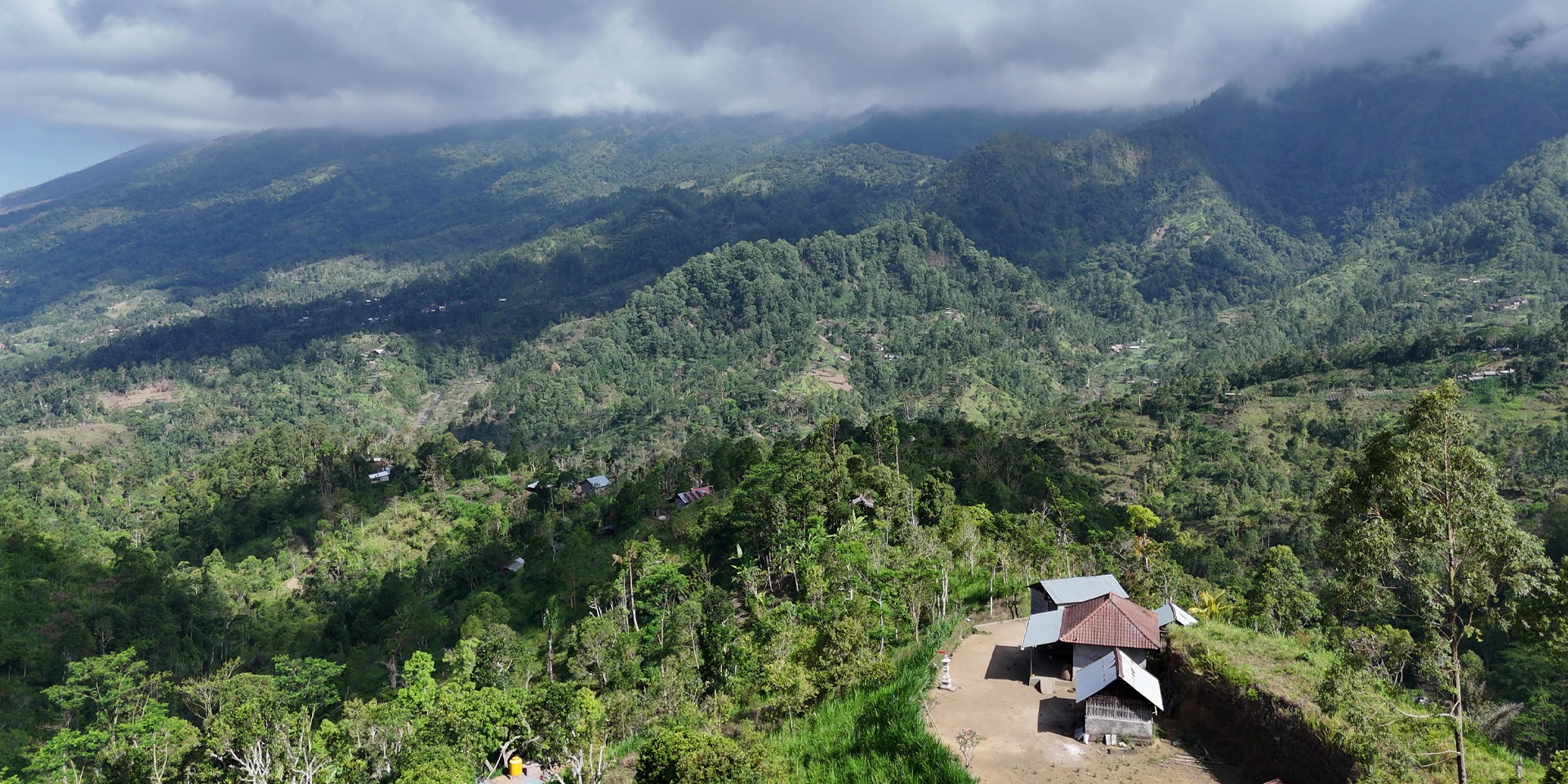 Aerial view of Ban Village in Mount Agung, with hamlets and communities spread across its green volcanic landscape | Photo: Rizky Hadwiyanti
