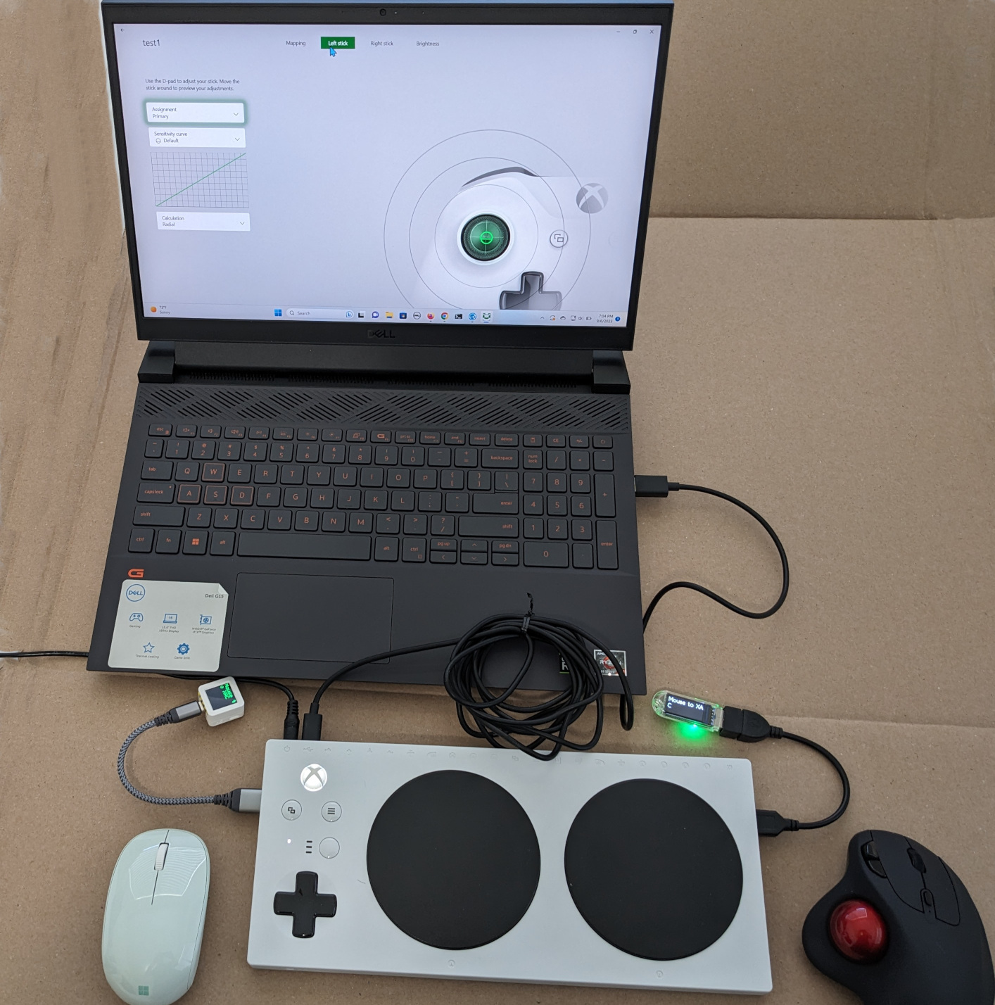 Bluetooth Low Energy (BLE) mouse and trackball plugged into Xbox Adaptive Controller USB joystick inputs.
