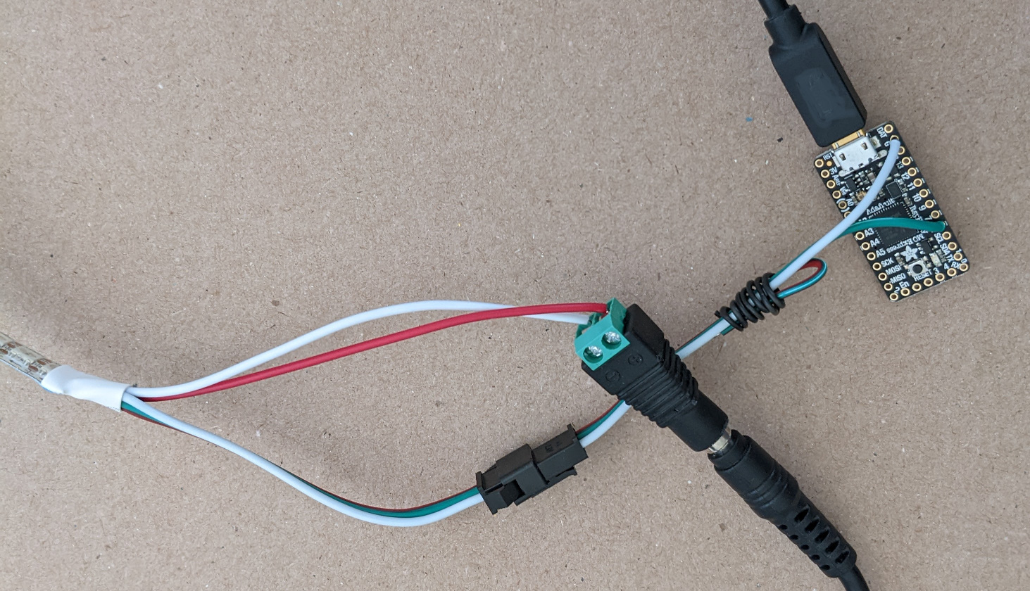 WS2812 LED strip connected to power and ItsyBitsy controller