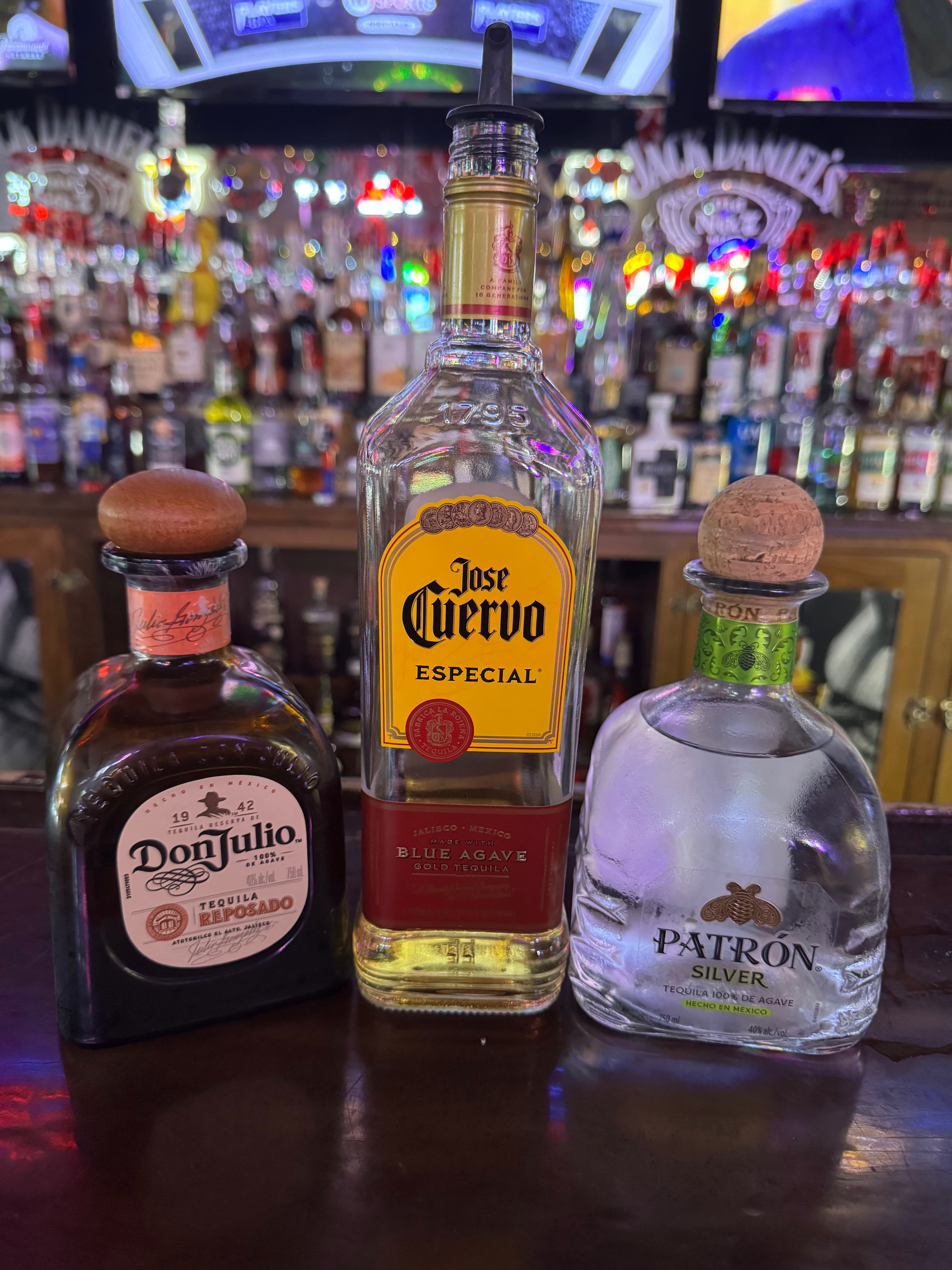 Patron Jose Cuervo Don Julio tequila bottles