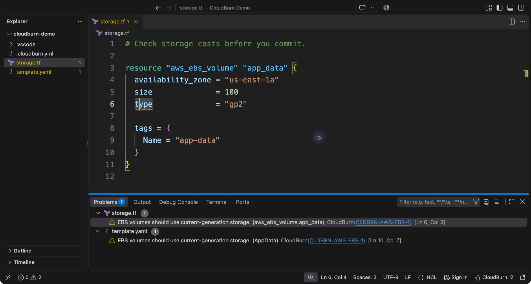 Terraform cost findings in VS Code, with an inline warning, linked rule IDs in Problems, and the CloudBurn status count