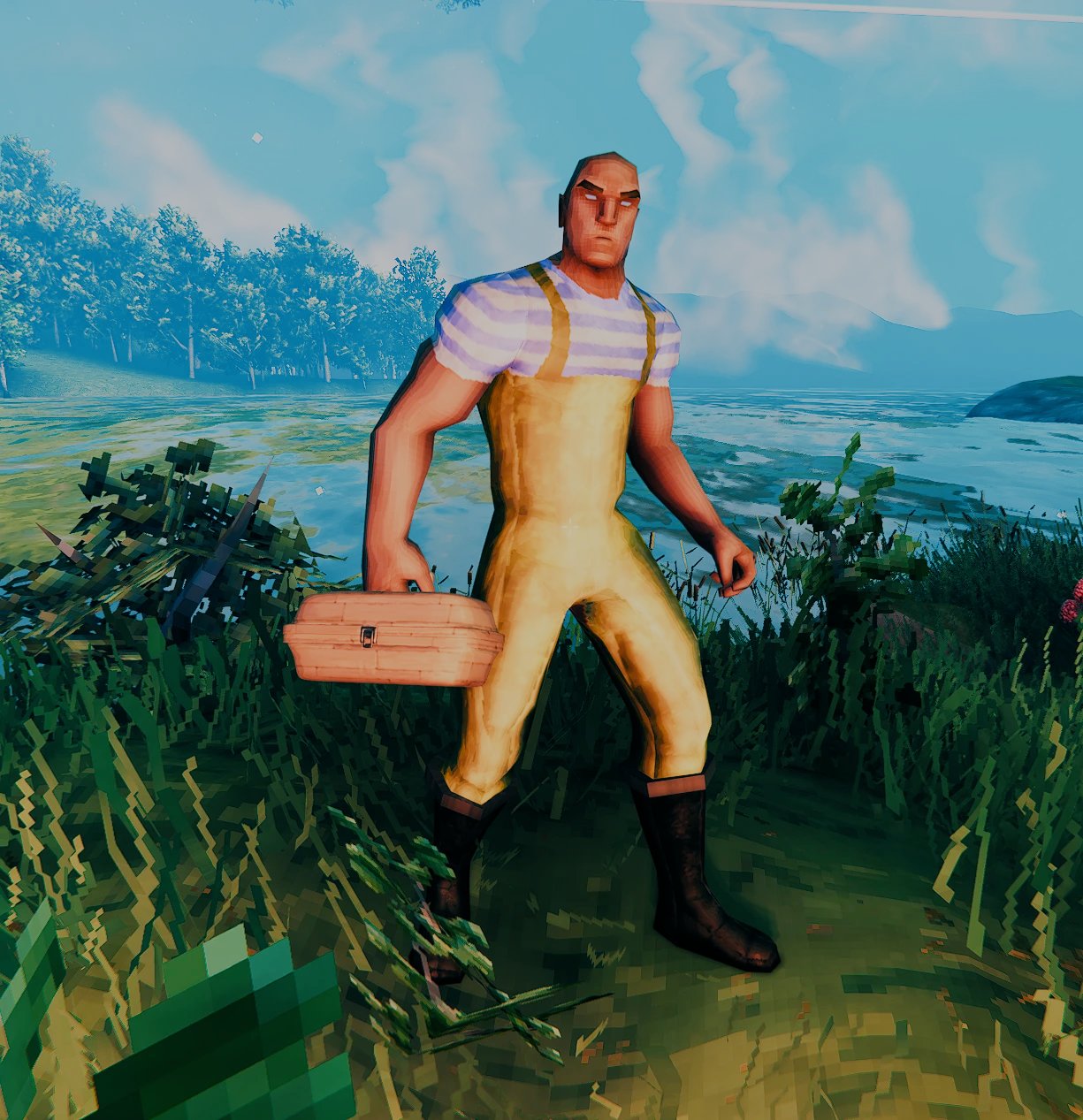 The Striped Fisher's Shirt and Oilskin Overalls with rubber boots, carrying a tackle box
