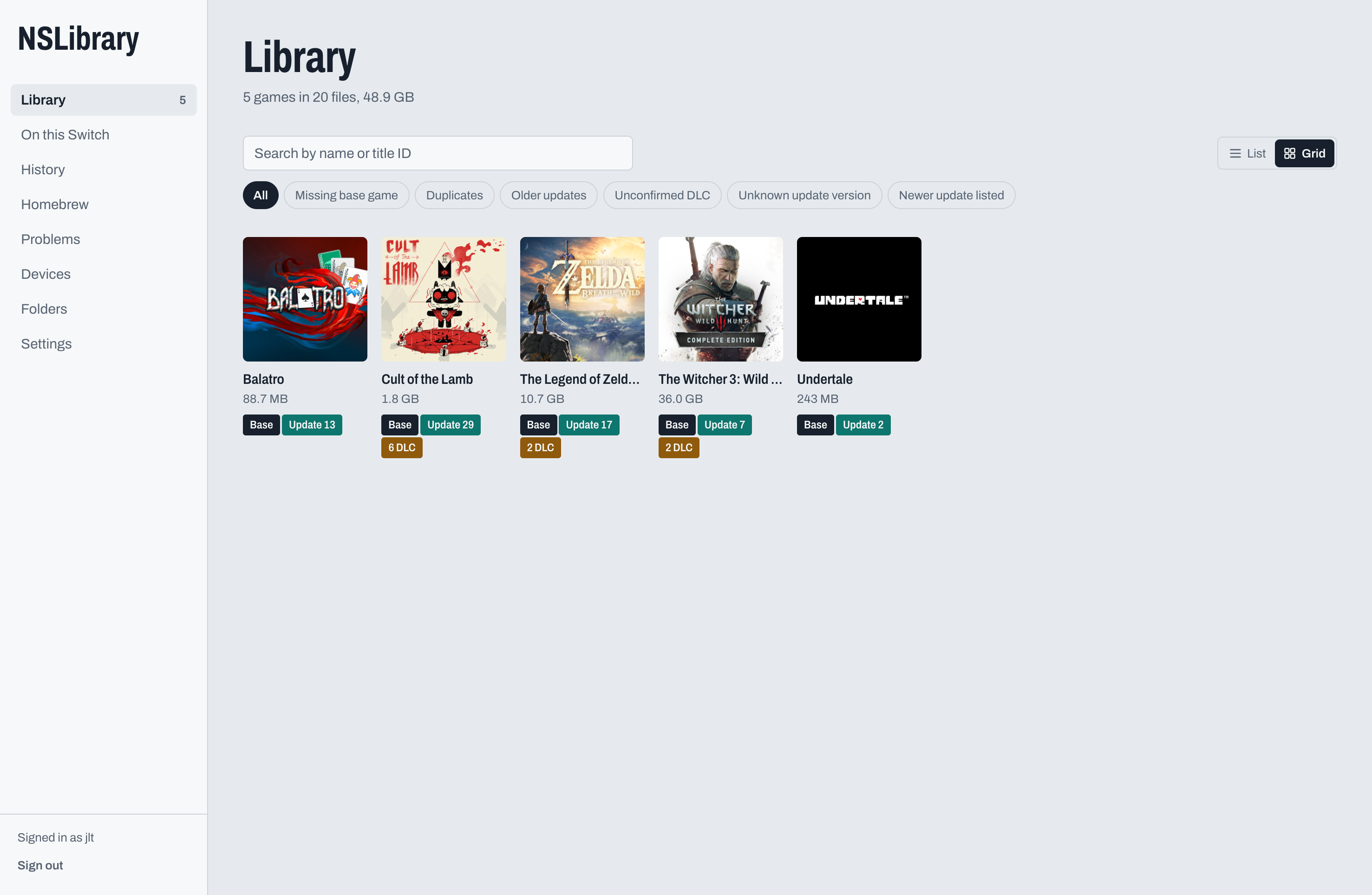 The web library, listing four games with their base, update, and DLC badges