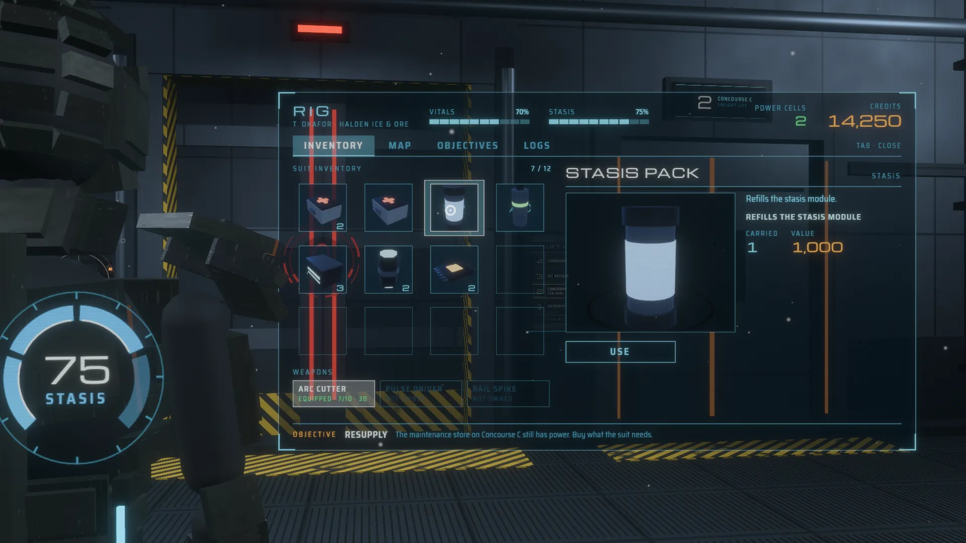 The suit menu projected into the room, the camera locked on it: a grid of item icons with the cursor on a stasis pack, the pack turning in the preview, vitals, power cells and credits along the top, the engineer's back and stasis gauge at the left edge.