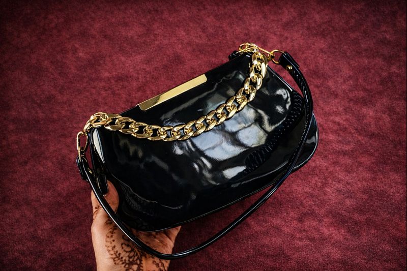 latest and trendy Sling Bag for girl & Women|Stylish Black Glossy Handbag with Gold Chain|Elegant Women's Glossy Shoulder Bag - Savéra collection
