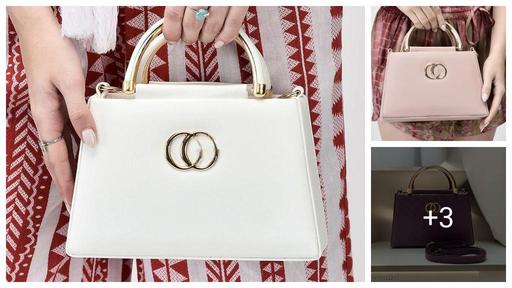 Designer Handbag with gold accents and detachable strap 