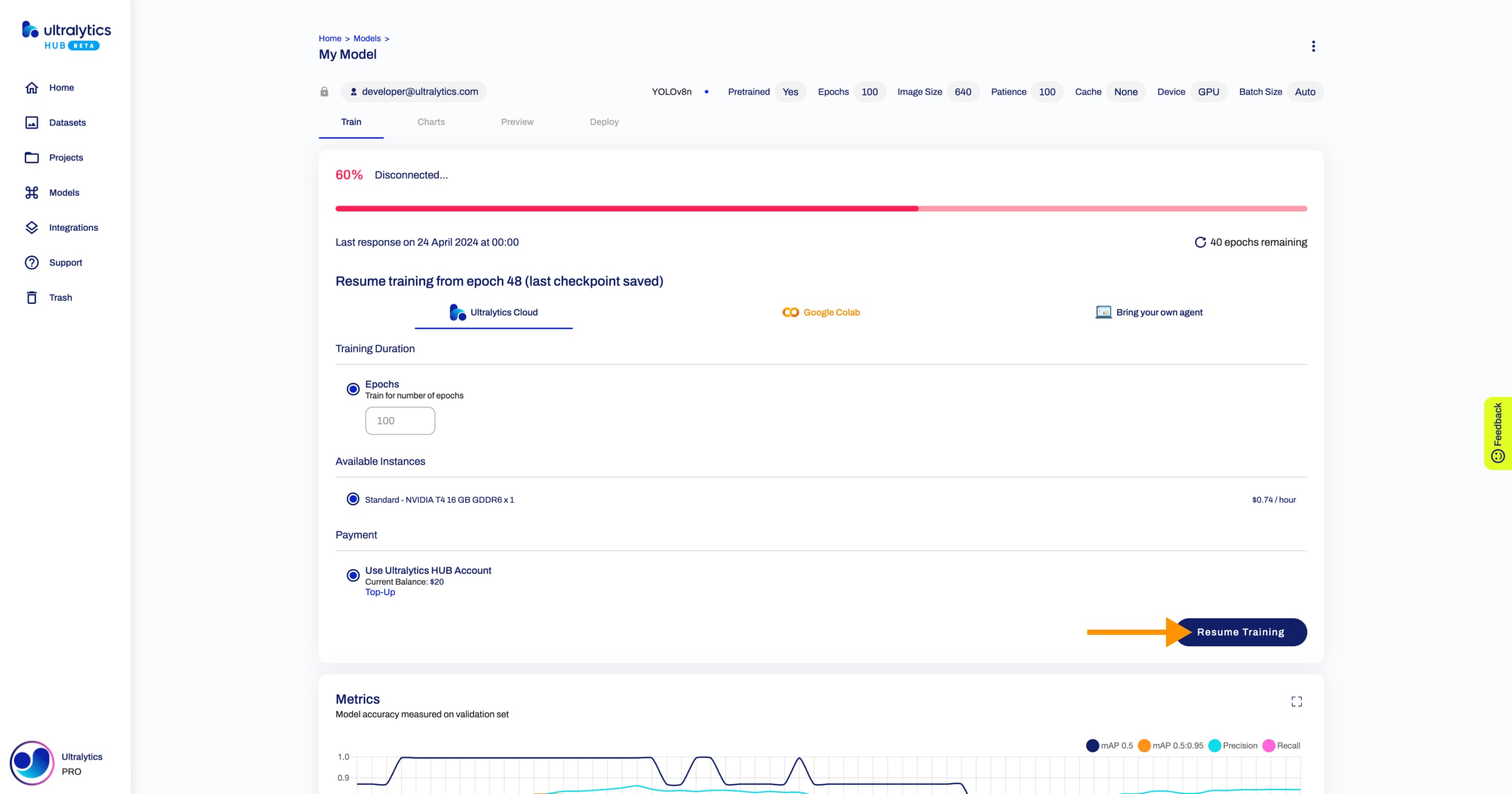 Ultralytics HUB screenshot of the Model page with an arrow pointing to the Resume Training button