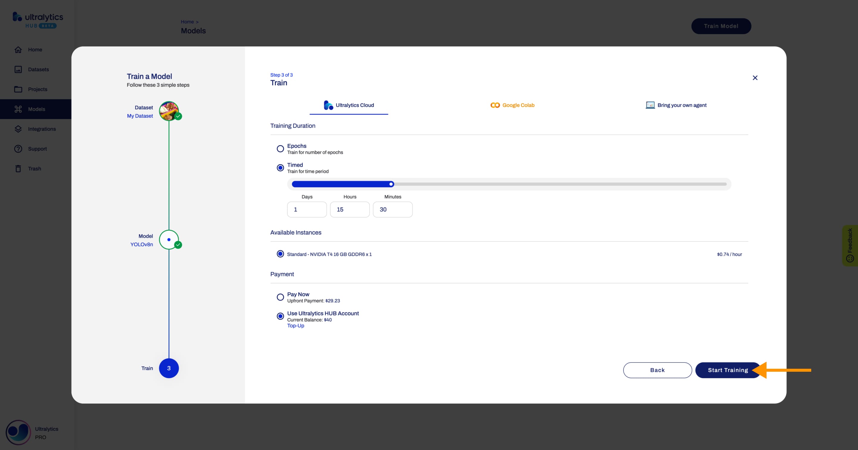 Ultralytics HUB screenshot of the Train Model dialog with an arrow pointing to the Start Training button