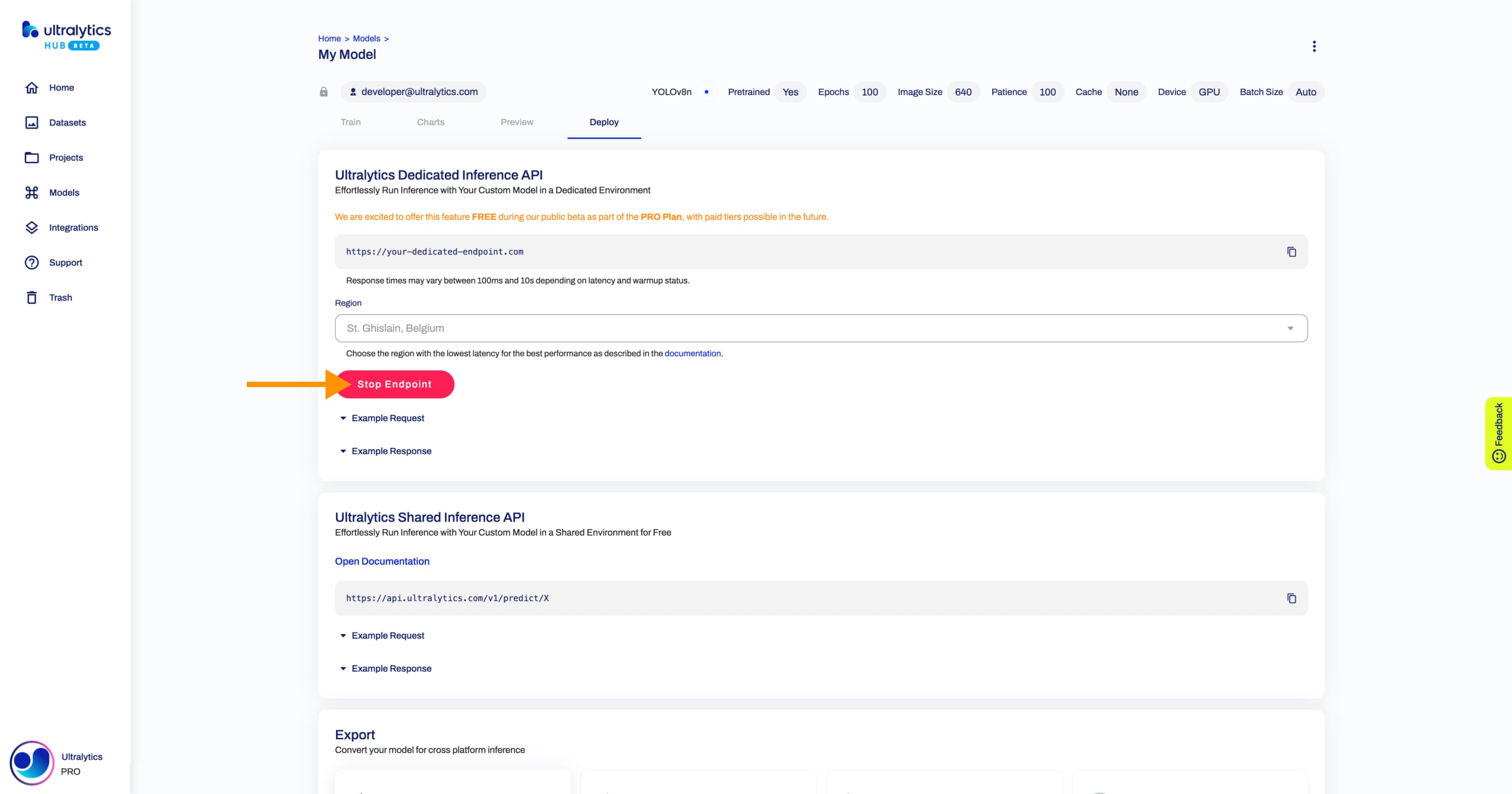 Ultralytics HUB screenshot of the Deploy tab inside the Model page with an arrow pointing to the Stop Endpoint button in Dedicated Inference API card