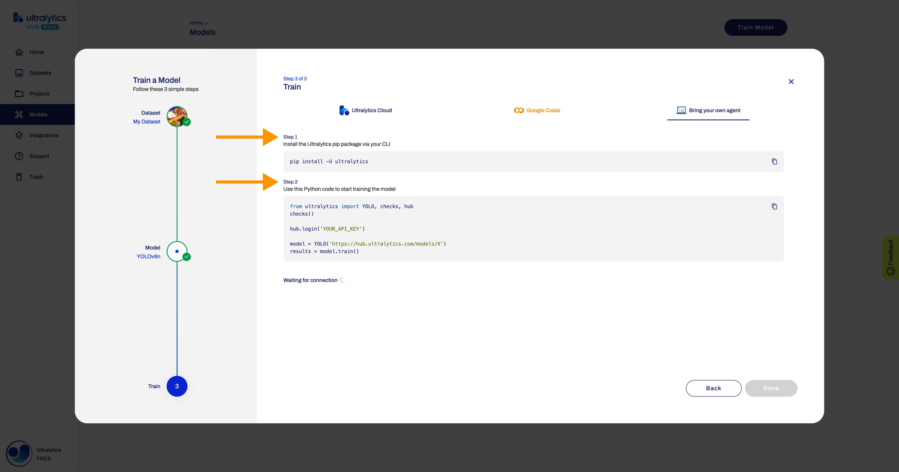 Ultralytics HUB screenshot of the Train Model dialog with an arrow pointing to the Done button