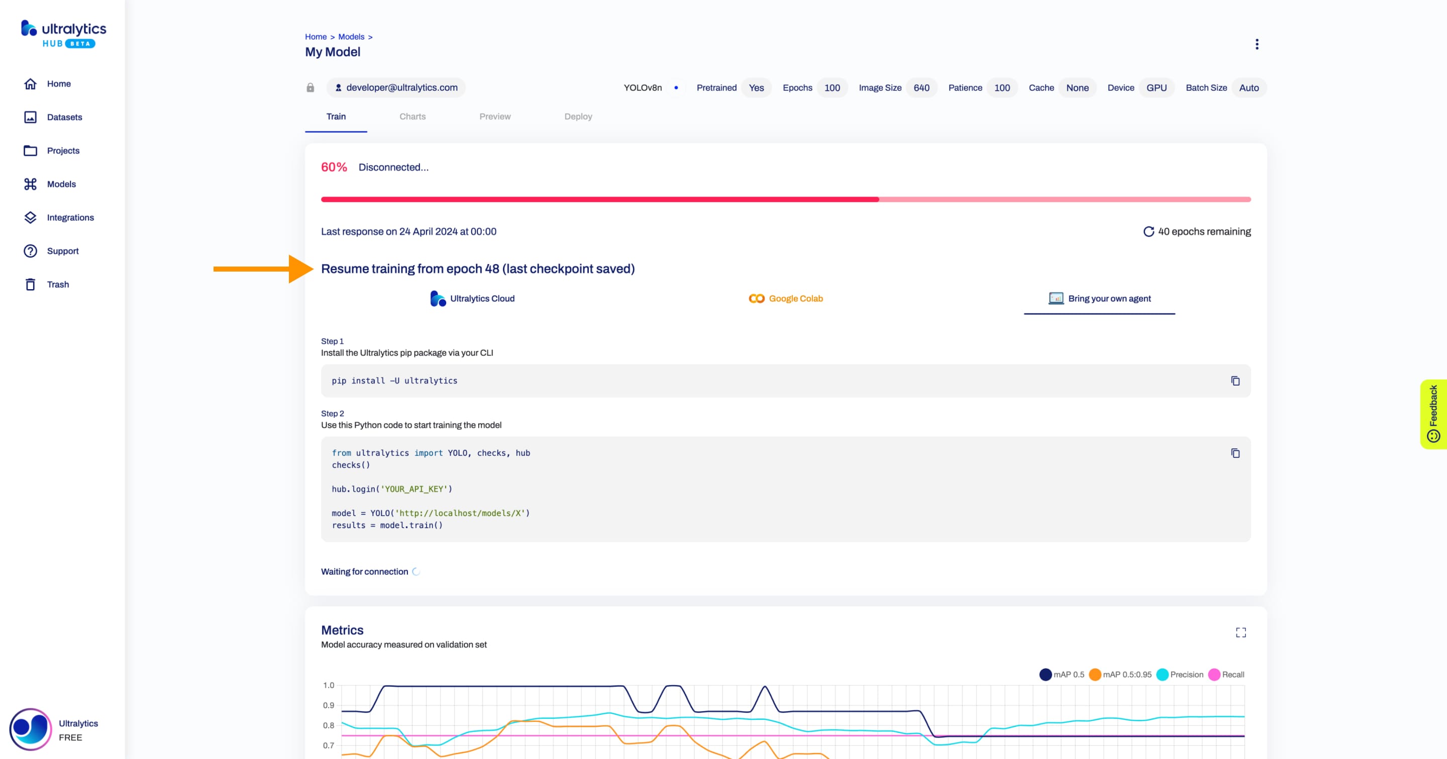 Ultralytics HUB-Screenshot der Modellseite mit einem Pfeil, der auf die Karte "Resume Training" zeigt