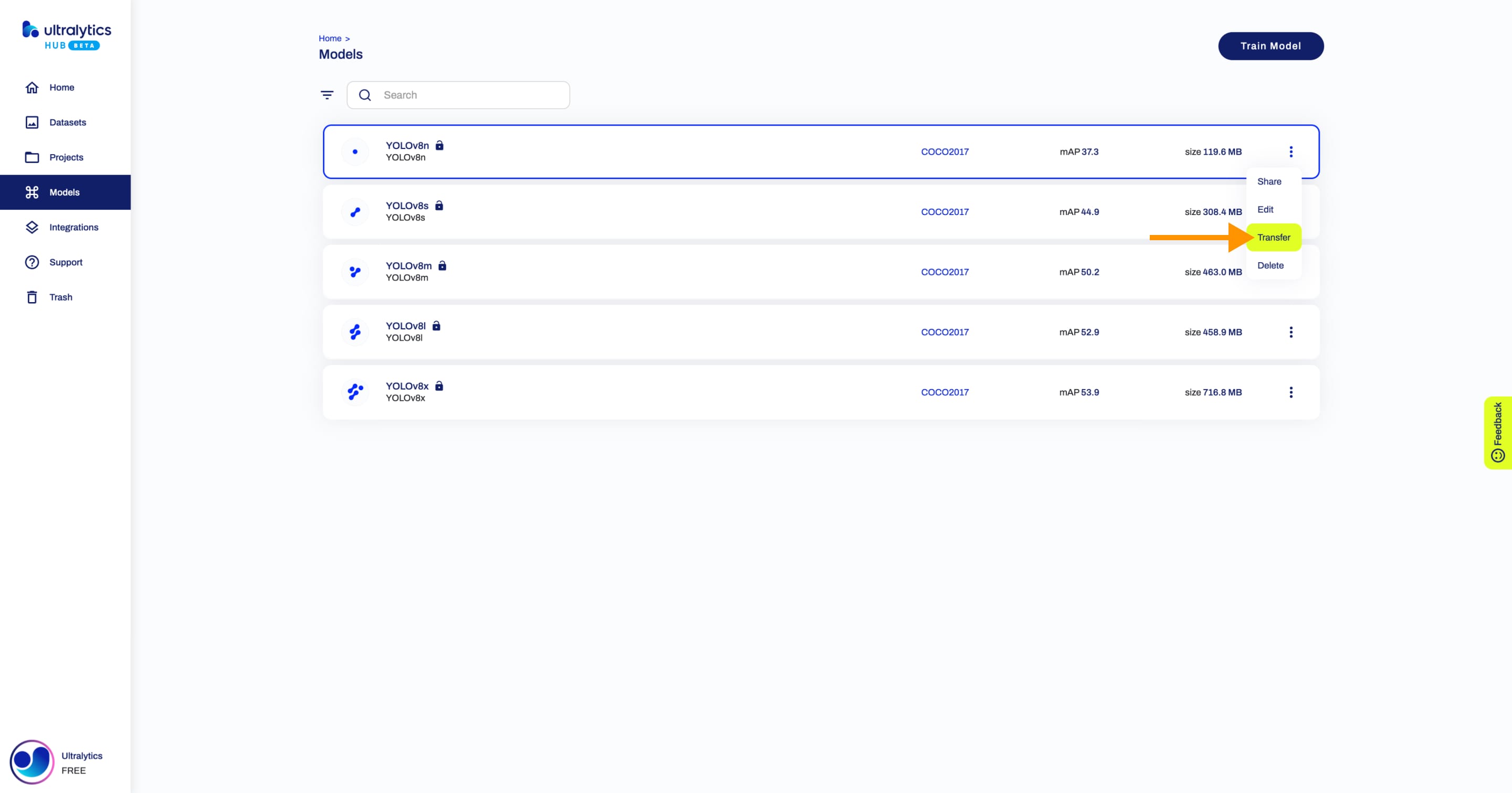 Ultralytics HUB screenshot of the Models page with an arrow pointing to the Transfer option of one of the models